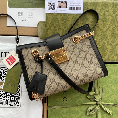 Medium-sized GUCCI Padlock Handbag with elegant design, luxury materials, and a secure padlock closure for a sophisticated look.